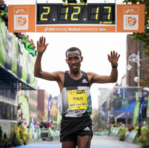 Dereje Debele Tulu from Ethiopia crosses the line to win the Dublin Marathon