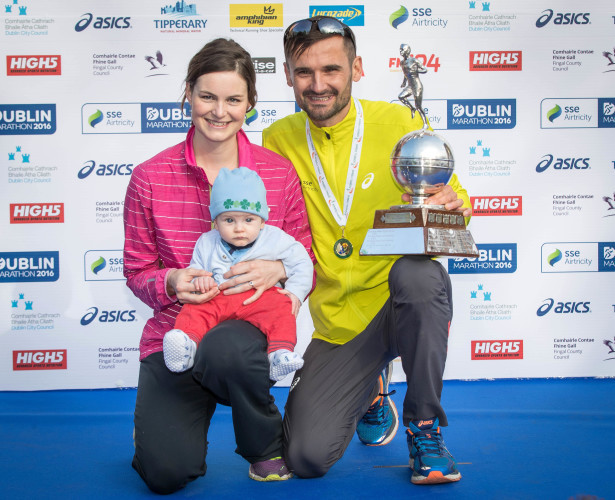 Sergiu Ciobanu celebrates winning the Irish National Championship with his son Daniel and wife Eimear