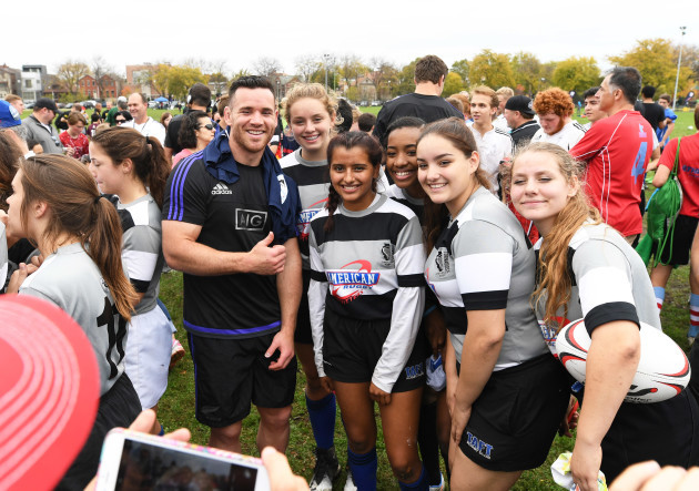Ryan Crotty poses for a photo with fans