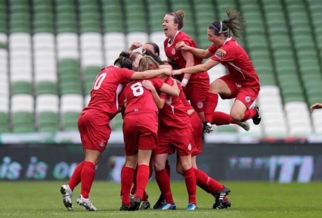 Siobhan Killeen celebrates scoring the first goal of the game with her teammates