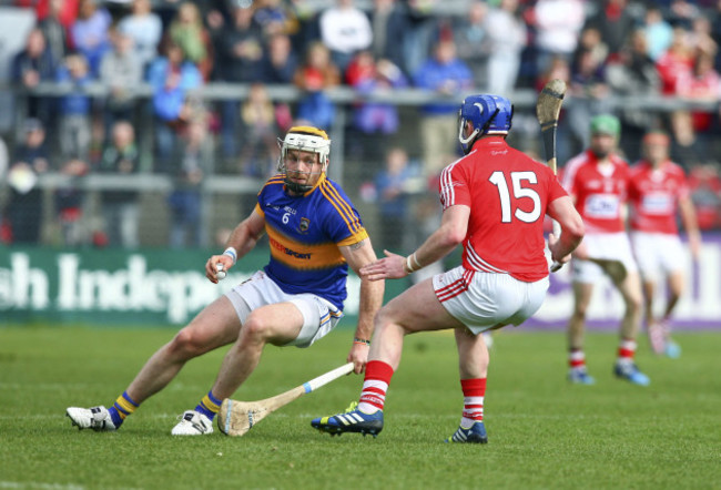 Padraic Maher in action against Patrick Horgan