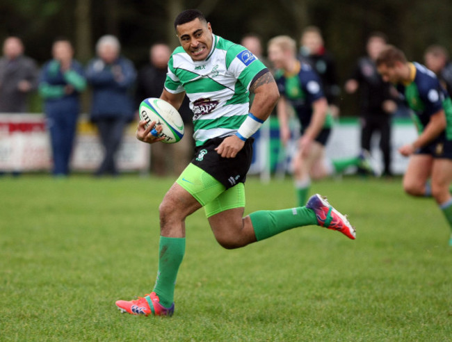 Paulie Tolofua runs in for a try