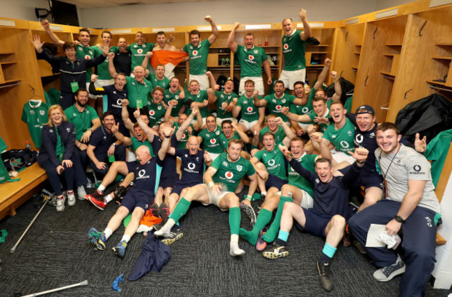 The Ireland team and management celebrate winning