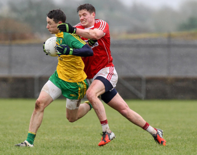 Eoin McHugh in action against Donal Óg Hodnett