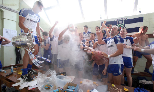 The Monaghan team celebrate in the dressing room after the game