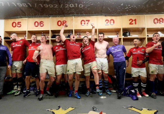 The Munster team celebrate winning