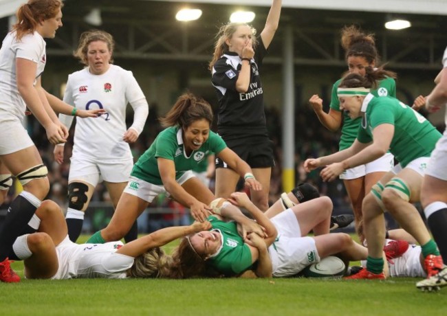 IrelandÕs Sene Naoupu celebrates with try scorer Nora Stapleton