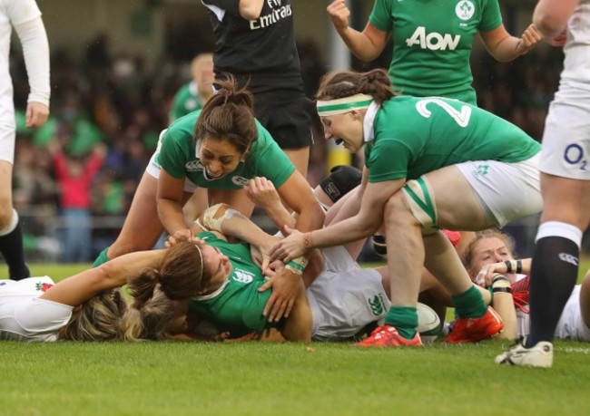 IrelandÕs Sene Naoupu and Chloe Pearse celebrates with try scorer Nora Stapleton