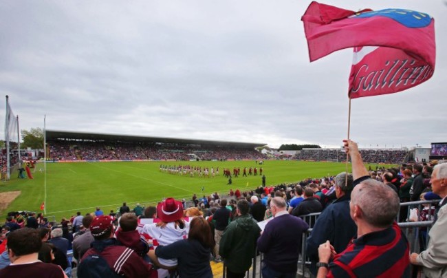 General view as the team parade behind the band