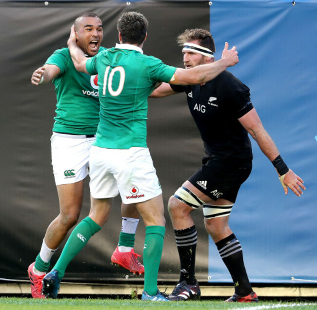 Simon Zebo celebrates scoring their fourth try with Jonathan Sexton