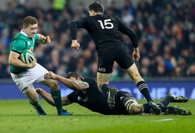 Paddy Jackson tackled by Liam Squire