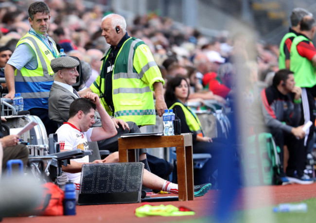 Sean Cavanagh dejected after being sent off