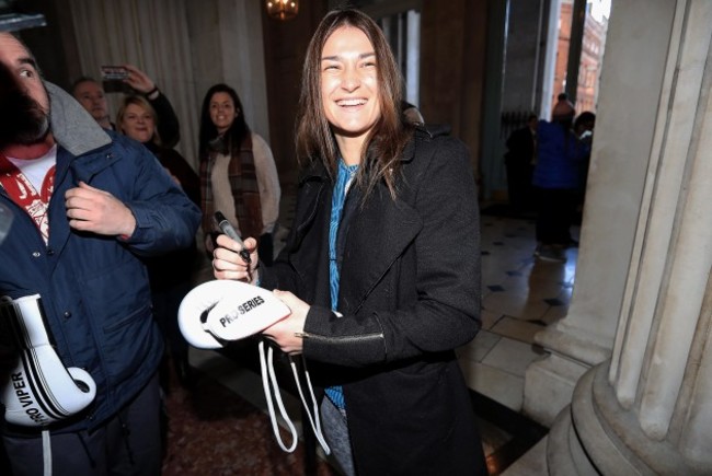 Katie Taylor signs autographs