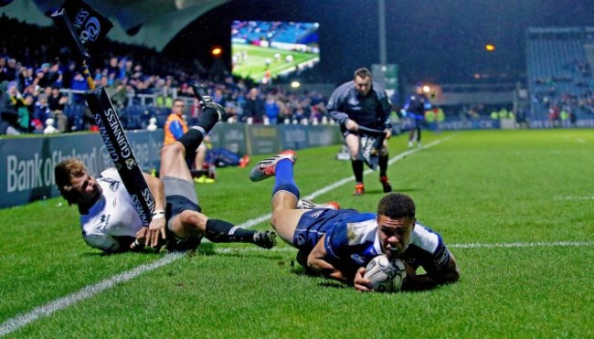 Adam Byrne runs in to score their fourth try