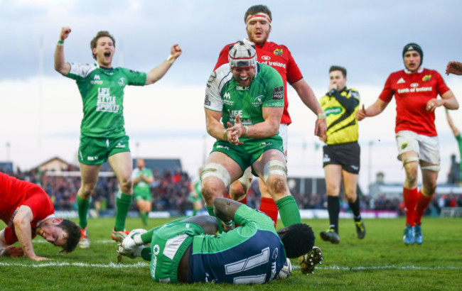 Kieran Marmion and Eoin McKeon celebrate with try scorer Niyi Adeolokun