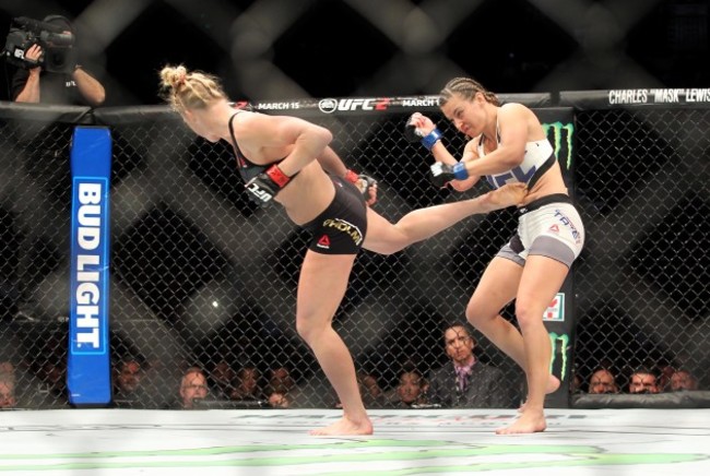 Miesha Tate with Holly Holm