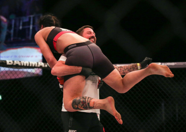 Sinead Kavanagh celebrates victory with Coach John Kavanagh