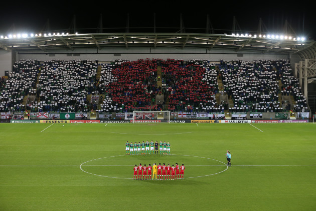 Northern Ireland fans during the minute's silence to remember those who died during the First World War