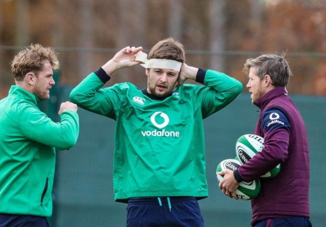 Iain Henderson with Jamie Heaslip and Simon Easterby