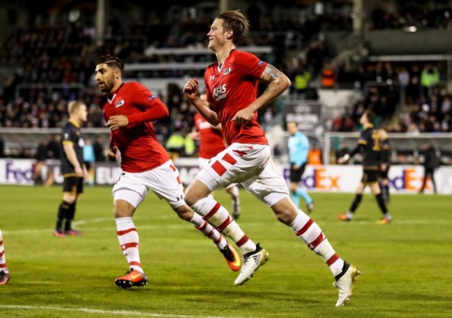 Wout Weghorst celebrates scoring his side's first goal of the game