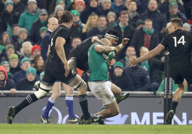 Malakai Fekitoa tackles Simon Zebo high