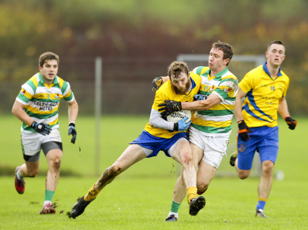 Tom OÕGorman is tackled by John Hayes