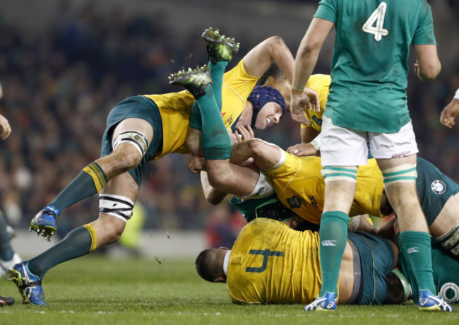 Dean Mumm tackles Tadhg Furlong