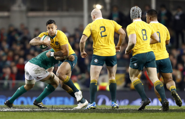 Israel Folau is tackled by CJ Stander