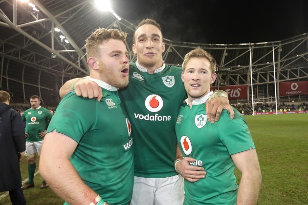 Finlay Bealham, Ultan Dillane and Kieran Marmion celebrate after the game