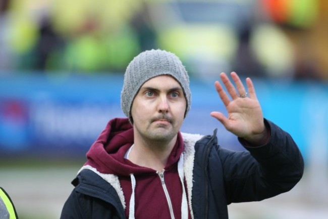 Mark Farren is applauded by the crowd at half-time