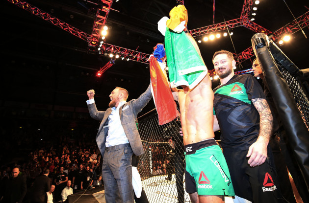 Conor McGregor celebrates with Artem Lobov following his victory