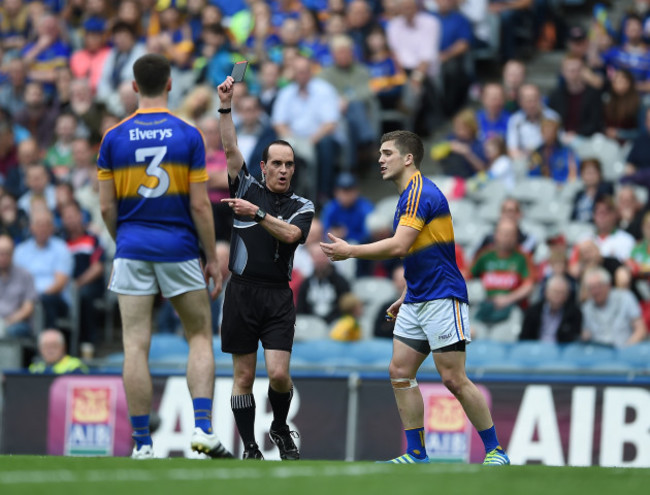 Robbie Kiely is shown a black card by referee David Coldrick