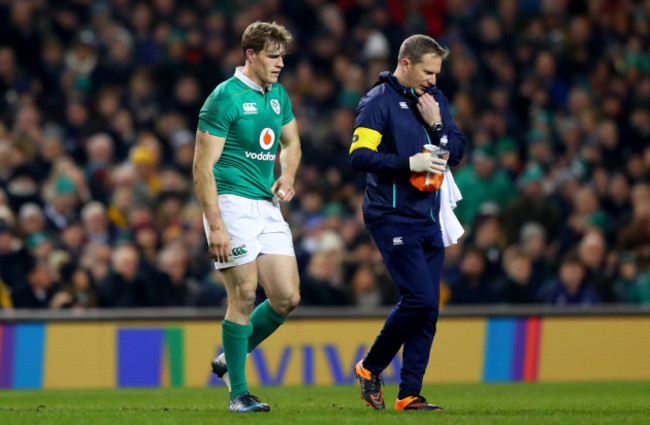 Andrew Trimble leaves the field injured with physio James Allen