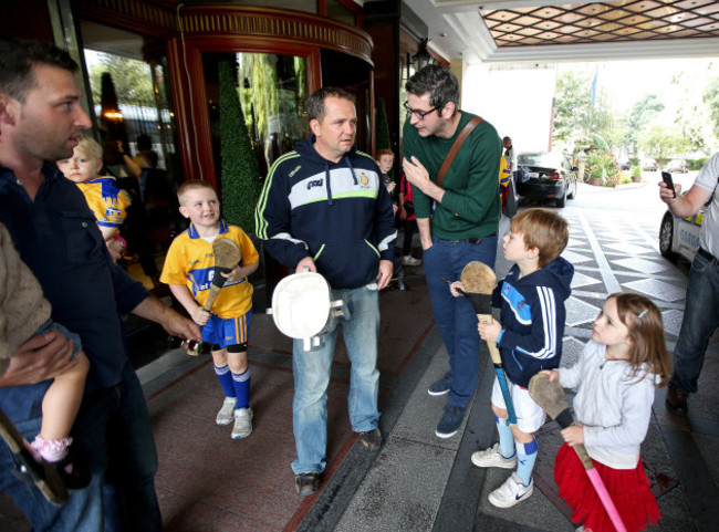 Davy Fitzgerald with the Liam McCarthy cup speaks with Ciaran Murphy of Second Captains