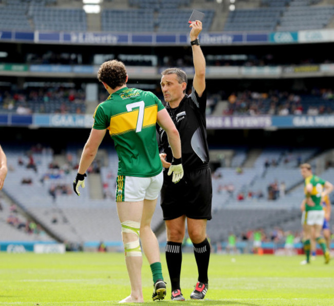 Maurice Deegan shows a black card to Tadhg Morley