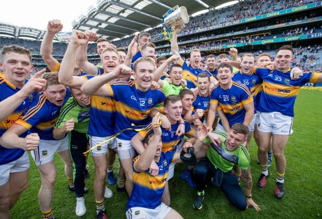Tipperary players celebrate with the Liam McCarthy Cup