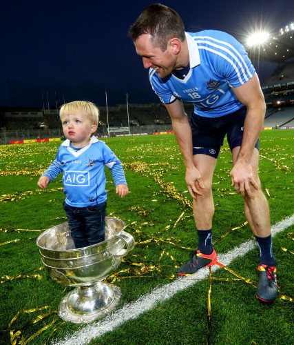 Denis Bastick sons Aidan in the Sam Maguire after the game