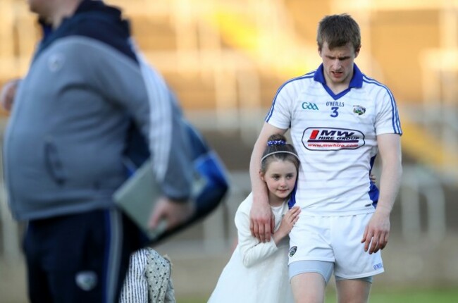Mark Timmons is congratulated by his daughter Kathleen