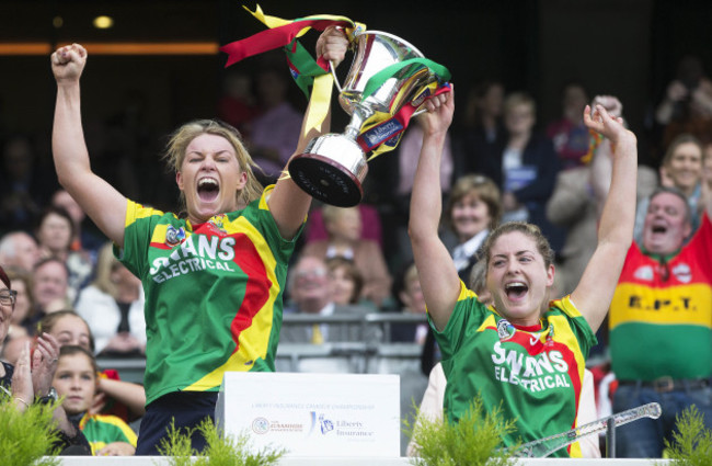 Teresa Meaney and Marian Doyle lift the trophy