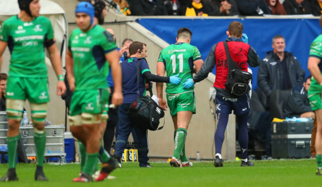 Cian Kelleher leaves the field injured