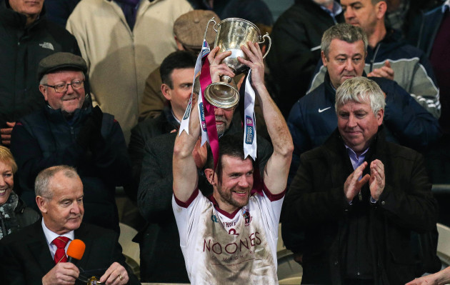 Francis McEldowney lifts the trophy