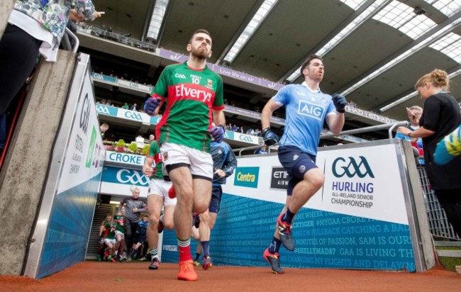 Dublin and Mayo players run out into Croke Park