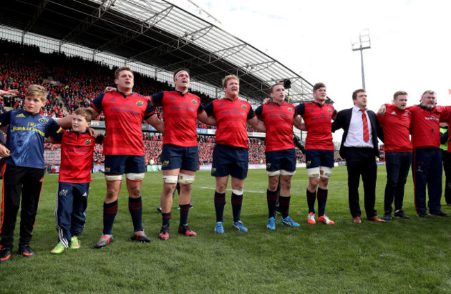 Tony and Dan Foley, sons of the late Anthony Foley sing with the Munster players after the game