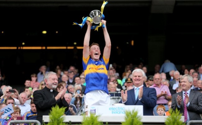Brian McGrath lifts the cup