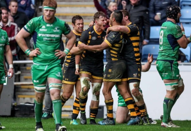 Josh Bassett celebrates his try