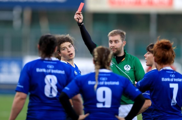 Jenny Murphy is shown a red card by Dan Carson