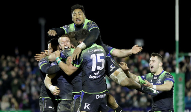 Connacht players celebrate with winning goal kicker Jack Carty