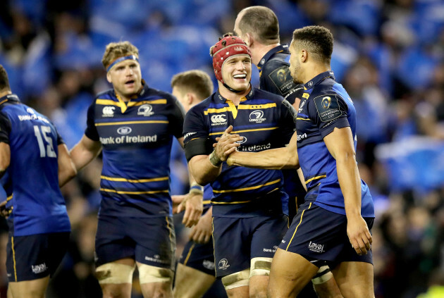 Adam Byrne celebrates scoring their third try with Josh Van der Flier