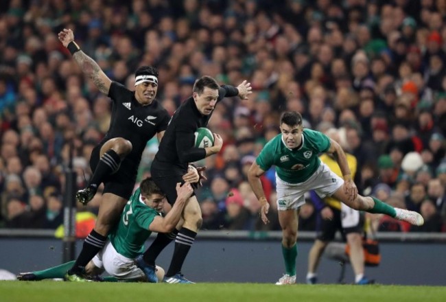 New Zealand All Blacks Ben Smith is tackled by Ireland&rsquo;s Garry Ringrose