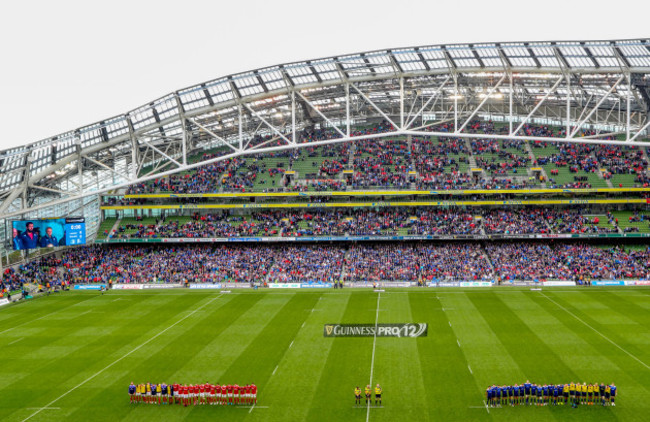 The teams observe a minutes silence